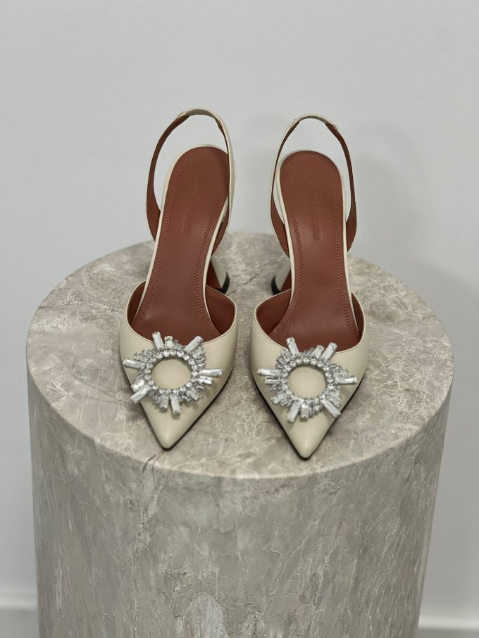 AMINA MUADDI BEGUM  LEATHER